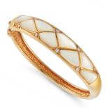 A VINTAGE MOTHER-OF-PEARL AND DIAMOND BANGLE, VAN CLEEF AND ARPELS in 18ct yellow gold, the tapering