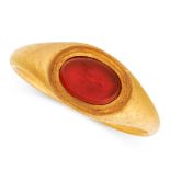 AN ANTIQUE CARNELIAN INTAGLIO RING 18TH - 19TH CENTURY in high carat yellow gold, set with an oval