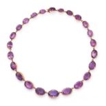 AN ANTIQUE AMETHYST RIVIERE NECKLACE, 19TH CENTURY in yellow gold, comprising a single row of