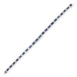 A SAPPHIRE AND DIAMOND LINE BRACELET, CIRCA 1950 comprising a single row of twenty-seven graduated