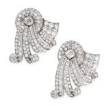 A PAIR OF VINTAGE DIAMOND CLIP BROOCHES each of scrolling design, set with principal round cut