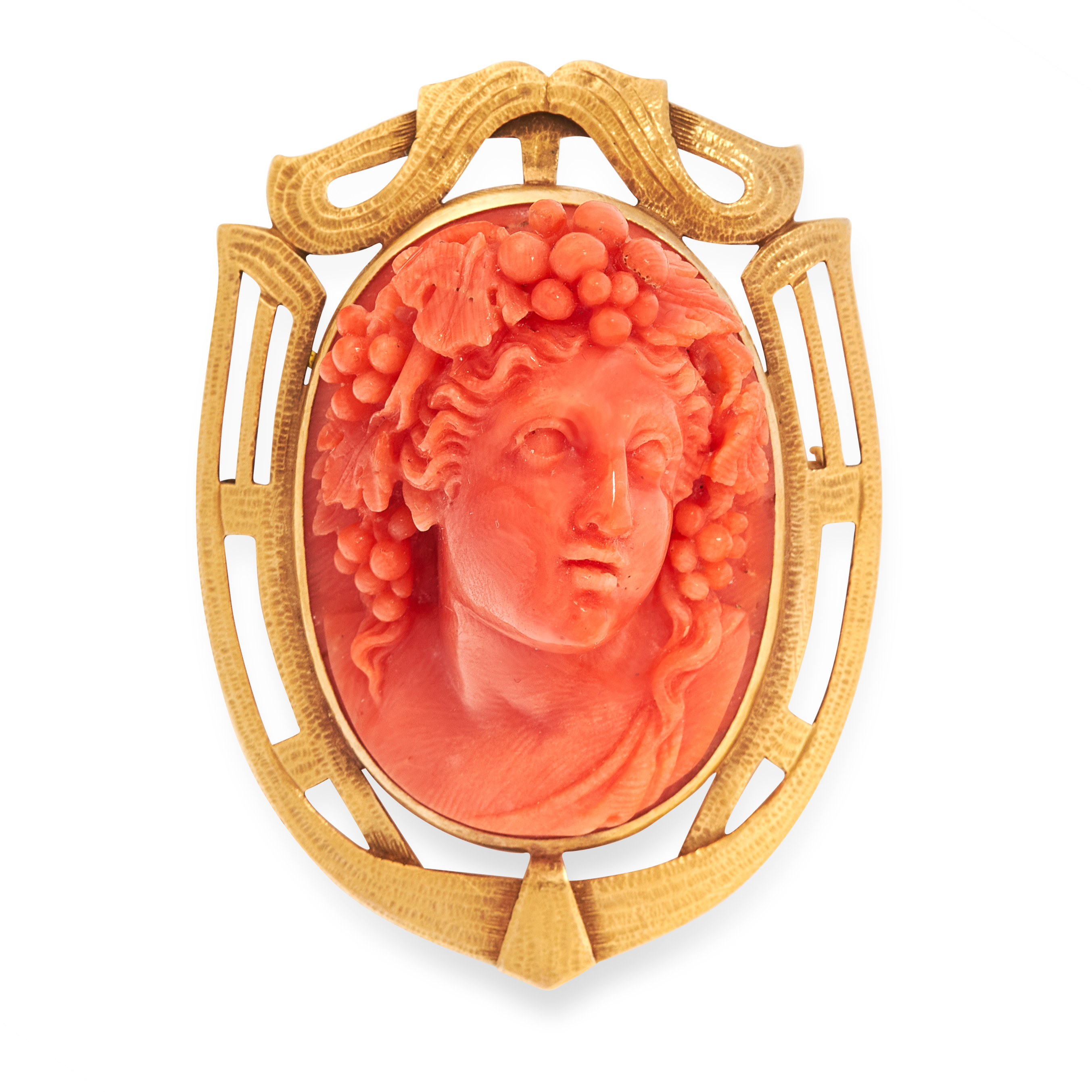 AN ANTIQUE CARVED CORAL CAMEO BROOCH, 19TH CENTURY in yellow gold, of shield design, set with a