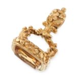 AN ANTIQUE CITRINE INTAGLIO FOB SEAL PENDANT, 19TH CENTURY in yellow gold, the foliate scroll