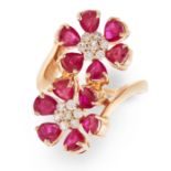 A RUBY AND DIAMOND DRESS RING in 14ct yellow gold, designed as two flowers set with clusters of