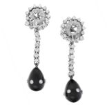 A PAIR OF ONYX AND DIAMOND PENDENT CLIP EARRINGS in 18ct white gold and platinum, of day and night