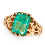 A COLOMBIAN EMERALD DRESS RING in high carat yellow gold, set with an emerald cut emerald of 2.85
