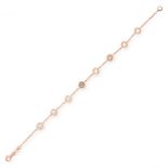 A DIAMOND LINE BRACELET in 18ct rose gold, in the manner of Diamonds by the Yard, comprising eight