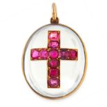 AN ANTIQUE RUBY AND ROCK CRYSTAL MOURNING LOCKET PENDANT, 19TH CENTURY in yellow gold, the oval