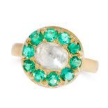 AN ANTIQUE DIAMOND AND EMERALD DRESS RING in yellow gold, the face set with a central rose cut