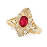 A RUBY AND DIAMOND DRESS RING in high carat yellow gold, set with an oval cut ruby of 0.55 carats