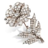 AN ANTIQUE DIAMOND EN TREMLBANT BROOCH, 19TH CENTURY in yellow gold and silver, designed as a