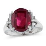 A GARNET AND DIAMOND DRESS RING in platinum, set with an oval cut garnet of 6.05 carats, the