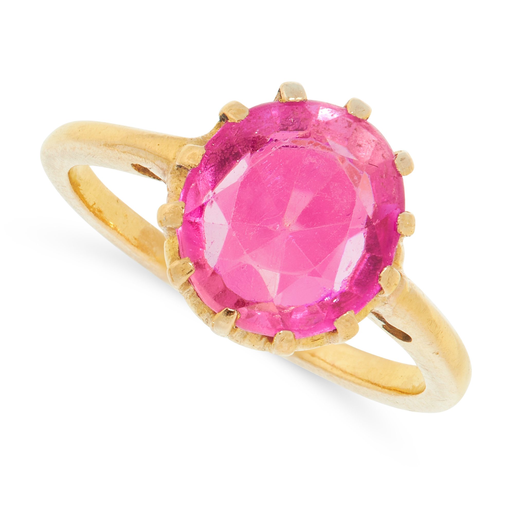 A GEMSET DRESS RING set with an oval cut pink gemstone in gold border, unmarked, size L / 6, 4.5g.