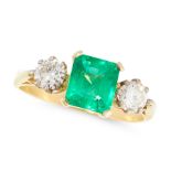 AN EMERALD AND DIAMOND DRESS RING in high carat yellow gold, set with an emerald cut emerald of 1.48