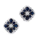 A PAIR OF SAPPHIRE AND DIAMOND CLIP EARRINGS in 18ct white gold, comprising of a central cluster