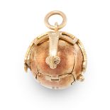A VINTAGE MASONIC BALL PENDANT / CHARM designed as a ball formed of hinged segments, opening to