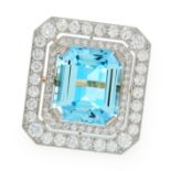 AN AQUAMARINE AND DIAMOND DRESS RING in high carat yellow gold, set with an emerald cut aquamarine