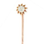 AN ANTIQUE DIAMOND TIE PIN / BROOCH in yellow gold, set with an old cut diamond of 0.50 carats in