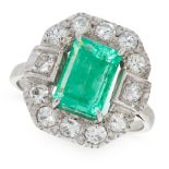 AN EMERALD AND DIAMOND CLUSTER RING comprising of an emerald cut emerald of 1.59 carats in a