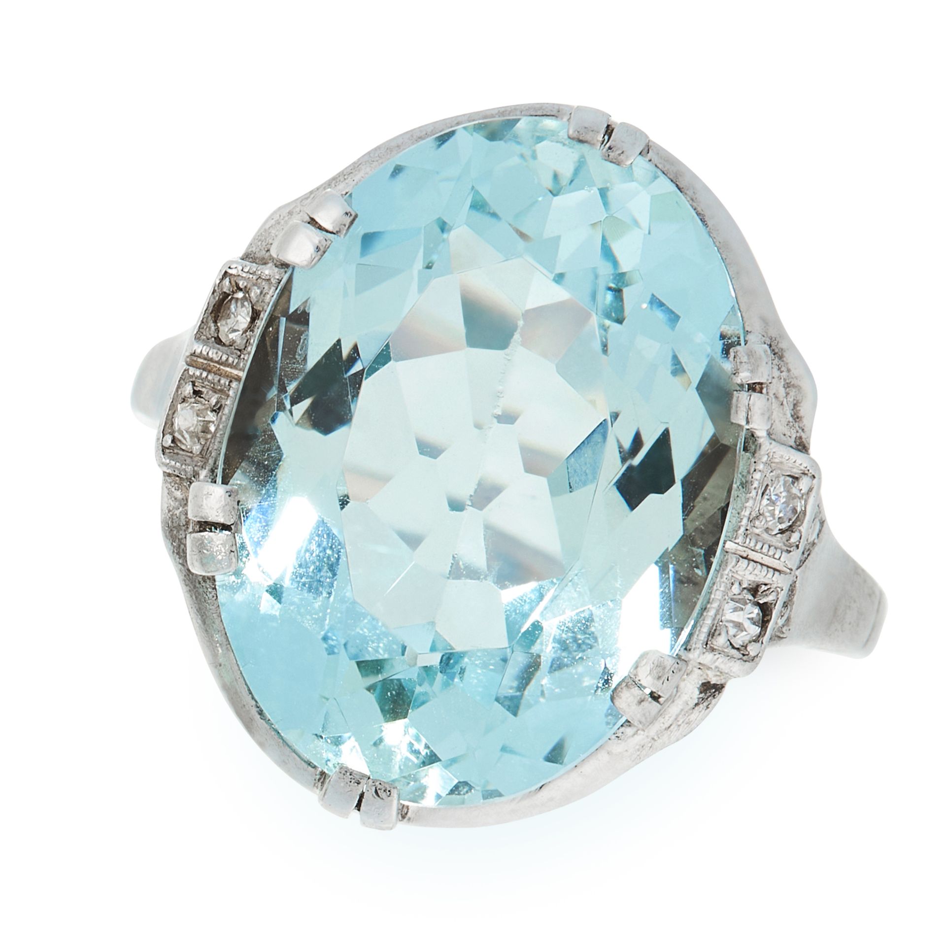 AN AQUAMARINE AND DIAMOND DRESS RING set with an oval cut aquamarine of 8.54 carats accented by four