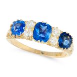 A SAPPHIRE AND DIAMOND DRESS RING in 18ct yellow gold, set with a trio of graduated cushion cut blue