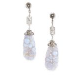 A PAIR OF ANTIQUE AGATE EARRINGS in silver, each formed of a carved and polished piece of pale