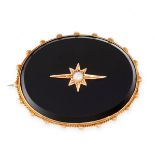 AN ANTIQUE ONYX AND PEARL MOURNING LOCKET BROOCH the oval face comprises of a single piece of