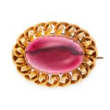 AN ANTIQUE GARNET MOURNING LOCKET BROOCH, 19TH CENTURY in yellow gold, set with an oval cabochon