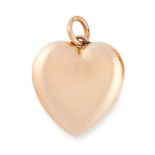 AN ANTIQUE HEART MOURNING LOCKET PENDANT in 15ct yellow gold, the hinged heart shaped body with