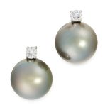 A PAIR OF PEARL AND DIAMOND EARRINGS each set with a round cut diamond, both totalling 0.47