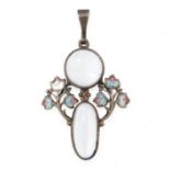 AN ANTIQUE ARTS & CRAFTS MOONSTONE AND ENAMEL PENDANT, JESSIE M KING CIRCA 1900 in silver, formed of