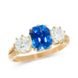 A CEYLON NO HEAT SAPPHIRE AND DIAMOND RING in high carat yellow gold, set with an emerald cut blue