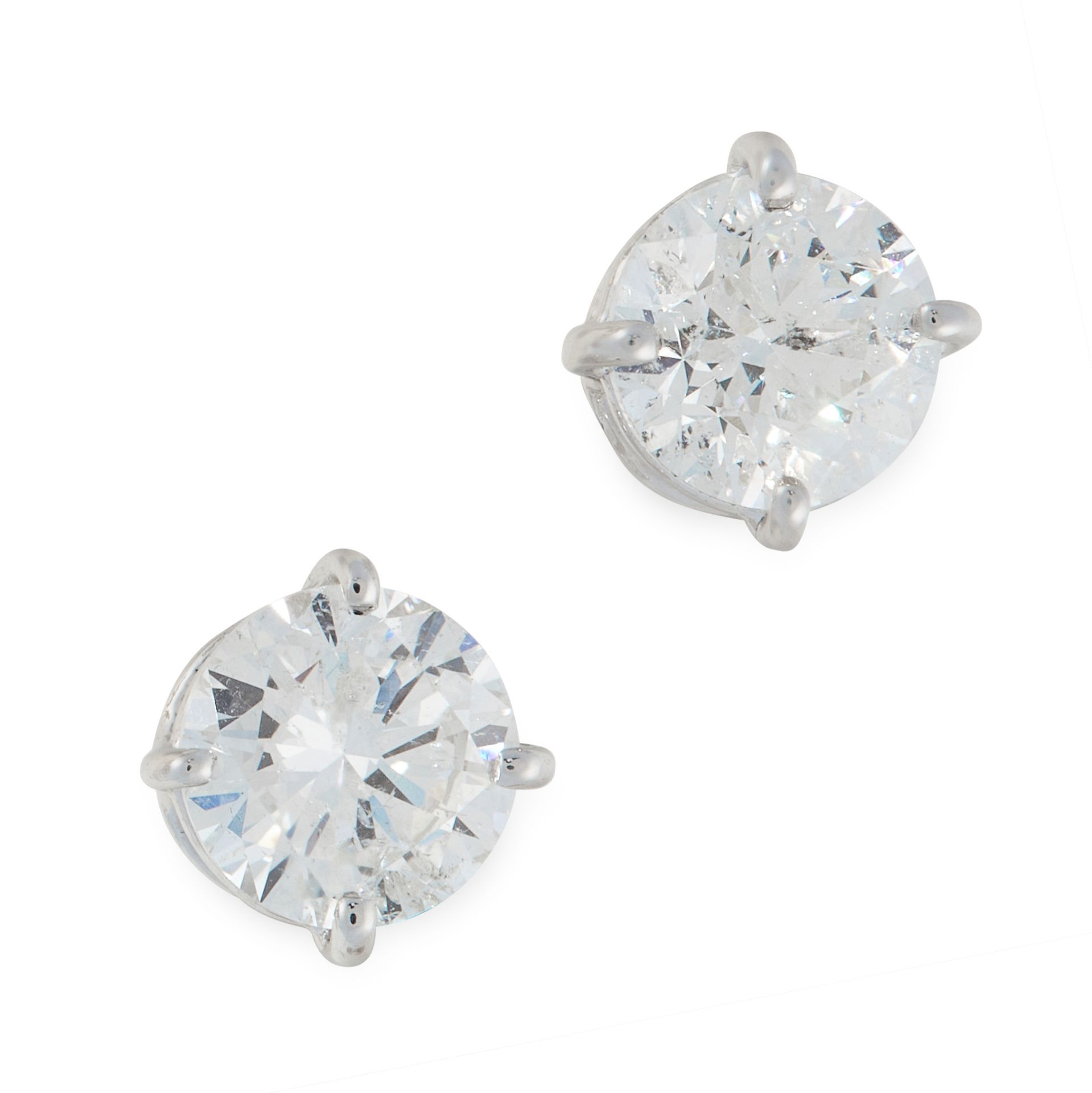 A PAIR OF DIAMOND STUD EARRINGS in 18ct white gold, each set with a round cut diamond totalling 2.24