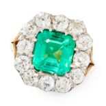 A COLOMBIAN EMERALD AND DIAMOND DRESS RING in yellow gold and silver, set with an emerald cut