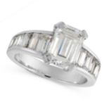 A DIAMOND DRESS RING set with an emerald cut diamond of 2.38 carats with further baguette cut