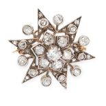 AN ANTIQUE DIAMOND STAR BROOCH / PENDANT, 19TH CENTURY in yellow gold and silver, designed as a