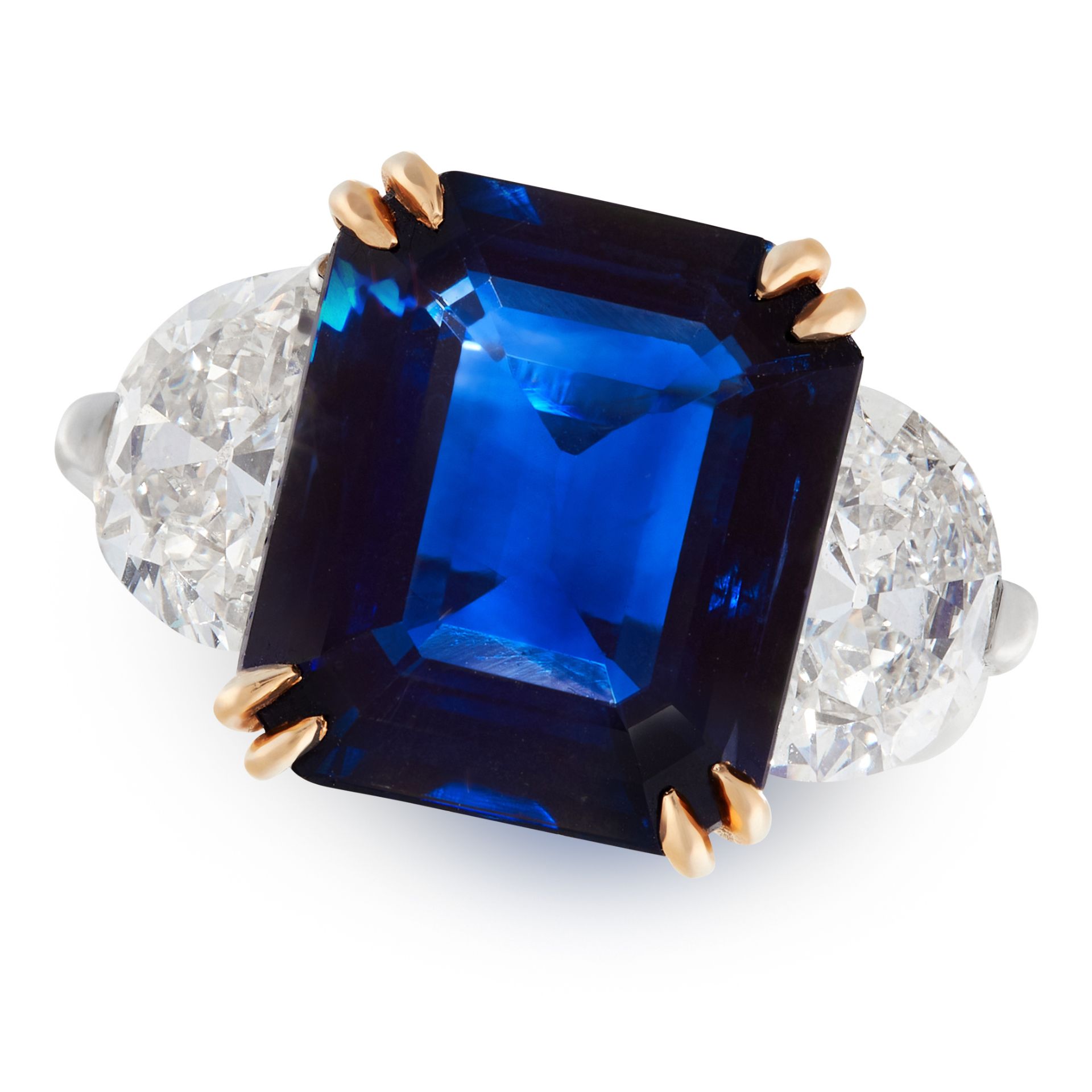 AN UNHEATED SAPPHIRE AND DIAMOND RING in 18ct white and yellow gold, set with an emerald cut