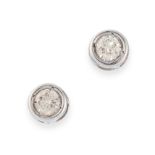 A PAIR OF DIAMOND STUD EARRINGS in 18ct white gold, each set with a round cut diamond, stamped