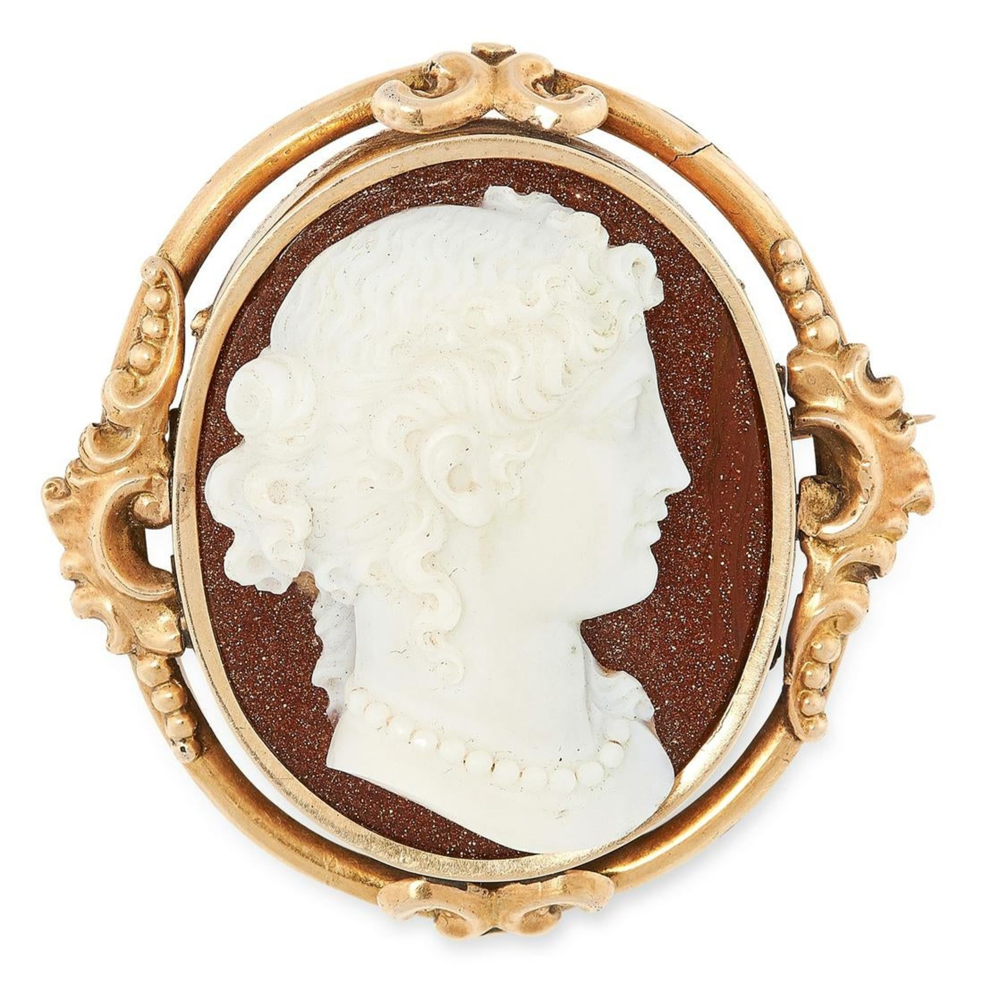 A GOLDSTONE CAMEO BROOCH comprising of a polished goldstone set with a carved cameo depicting a