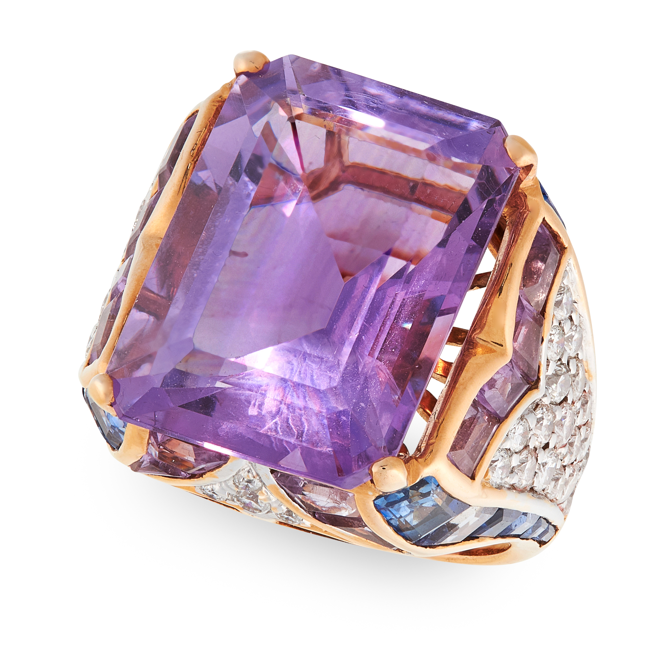 AN AMETHYST DIAMOND AND SAPPHIRE DRESS RING set with a central emerald cut amethyst of approximately