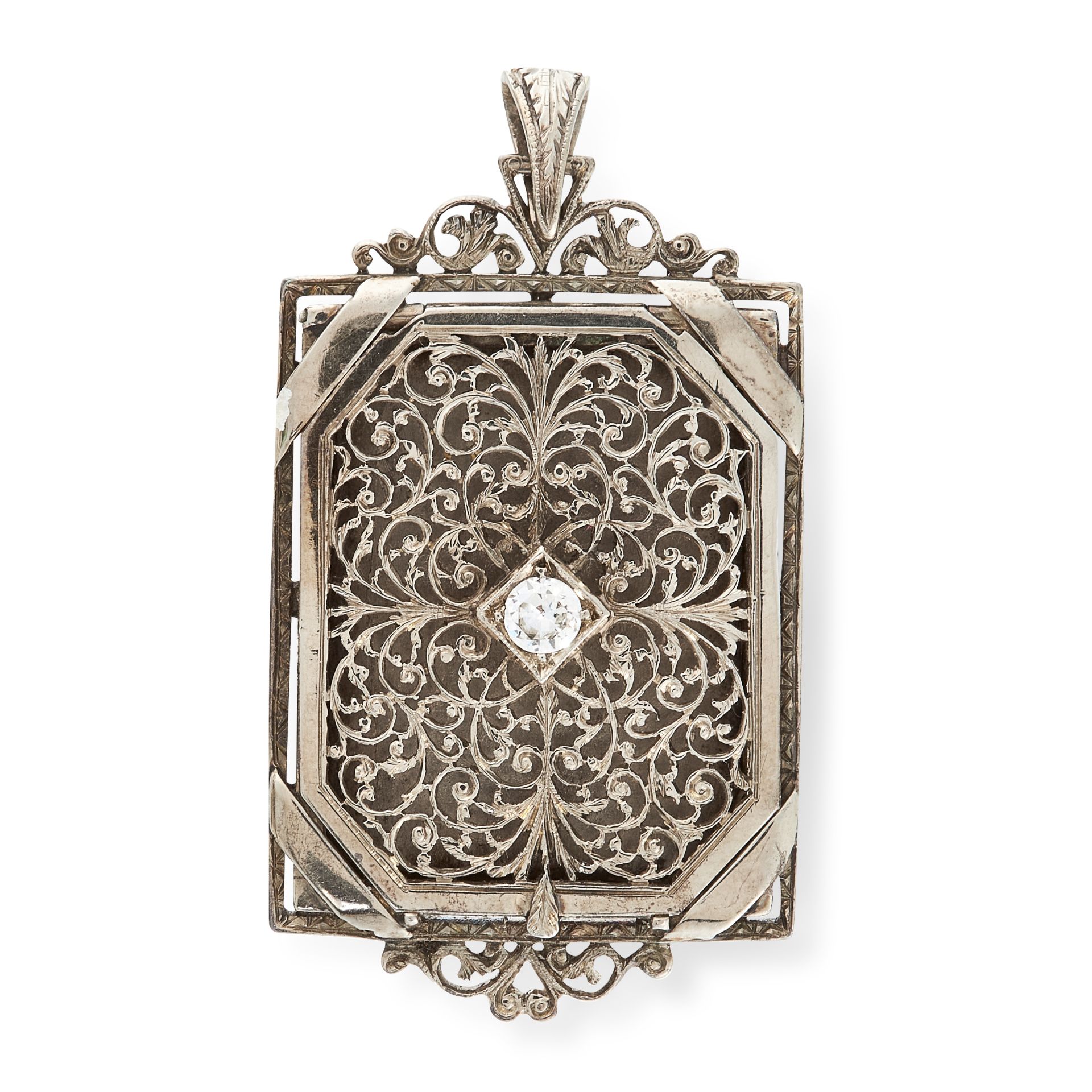 A DIAMOND LOCKET PENDANT designed as a book, set with a central round cut diamond, unmarked, 4.