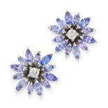 A PAIR OF TANZANITE AND DIAMOND FLOWER EARRINGS in 18ct white gold, designed as flowers, set with