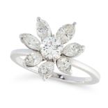 A DIAMOND FLOWER RING in white gold, designed as an articulated flower, set with a round cut diamond
