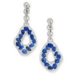 A PAIR OF SAPPHIRE AND DIAMOND EARRINGS in 18ct white gold, each comprising of four circular