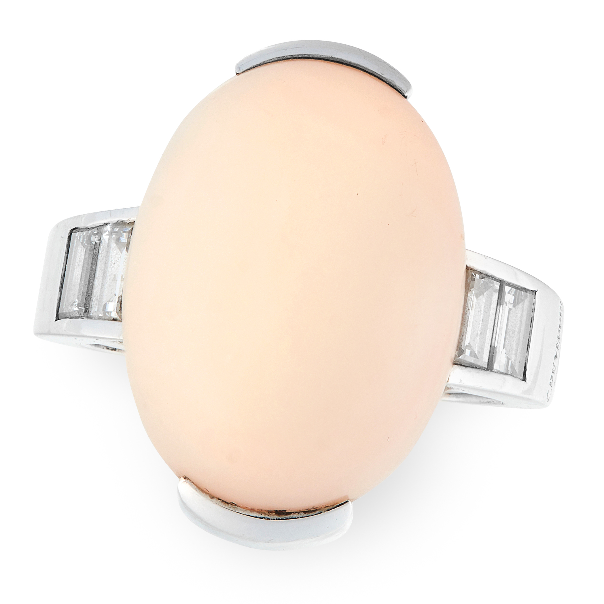 A CORAL AND DIAMOND DRESS RING in 18ct white gold, set with an oval cabochon coral of 2cm and