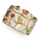 A CARVED ROCK CRYSTAL, SAPPHIRE, EMERALD, OPAL, RUBY AND SMOKEY QUARTZ RING comprising of a carved