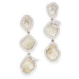 A PAIR OF DIAMOND DROP EARRINGS in 18ct white gold, each comprising of three flat cut diamond drops,