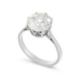 A SOLITAIRE DIAMOND DRESS RING in platinum, set with an old cut diamond of 2.47 carats, stamped