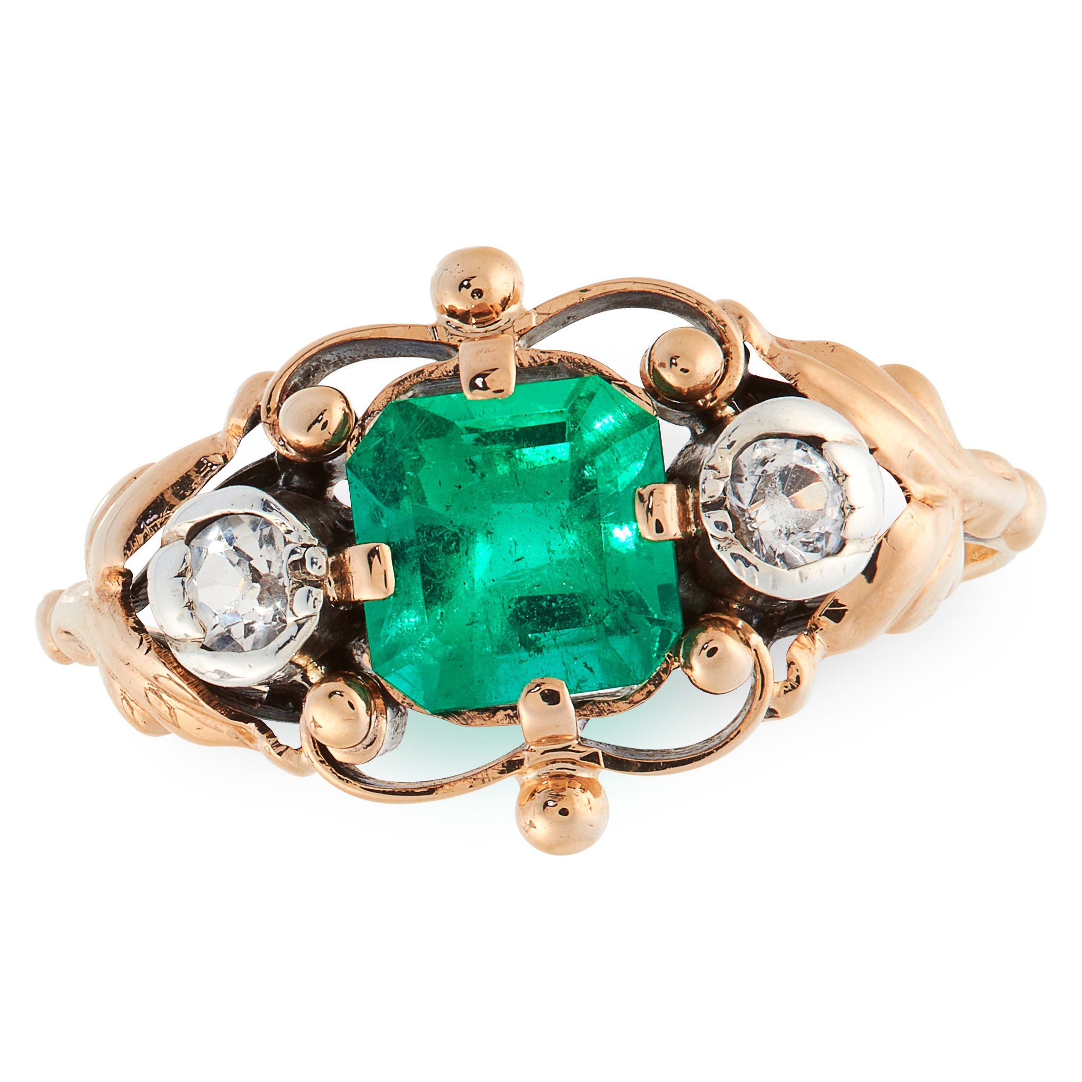 A COLOMBIAN EMERALD AND DIAMOND RING, CIRCA 1945 in 18ct yellow gold, set with an octagonal cut