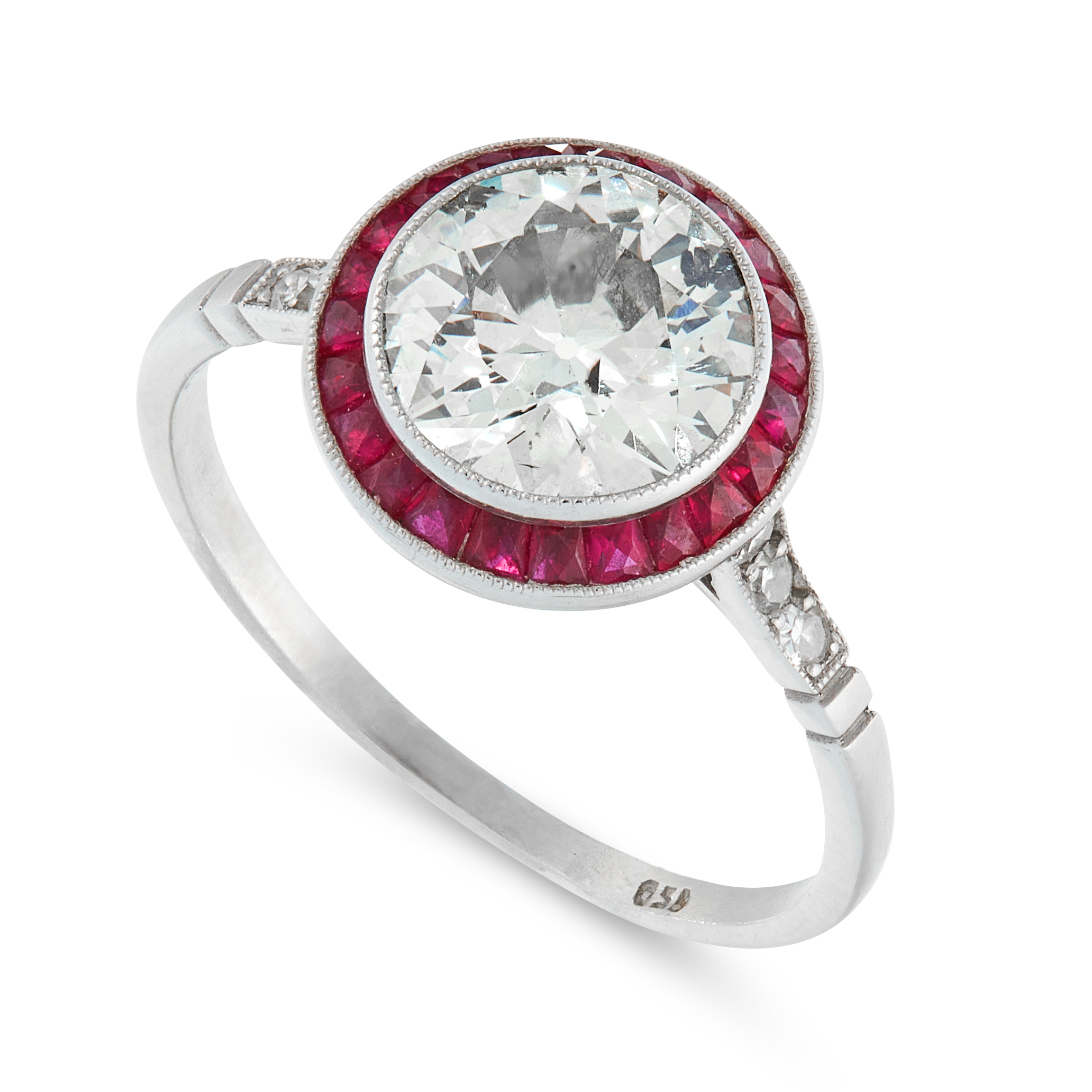 A DIAMOND AND RUBY TARGET RING in Art Deco design, in platinum, set with a central old European